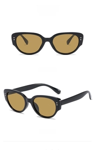 Front and side view of cat eye sunglasses with black frame and brown lenses