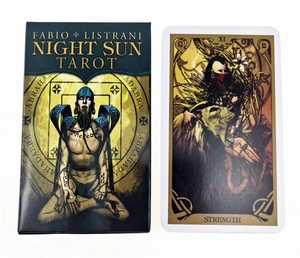 Detailed view of the Night Sun Tarot box set and the Strength card by Fabio Listrani