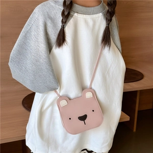 Cute pink bear-shaped crossbody bag for children with adjustable shoulder strap