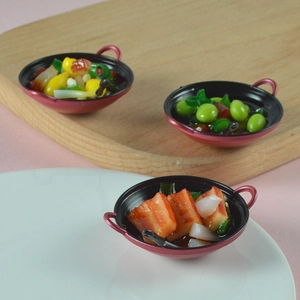 Miniature food play set with braised pork and vegetables in tiny red cooking pots
