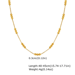 Detailed view of golden bead chain necklace with 0.3cm beads and 40-45cm length