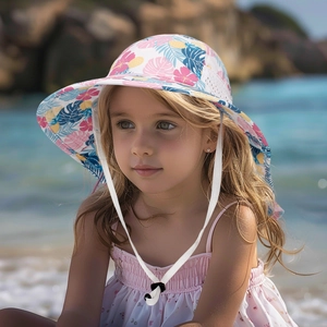 Close-up of kids floral sun hat with pink tropical print and breathable side mesh detail