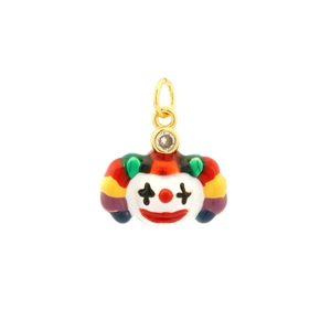 Macro detail of colorful enamel clown pendant with sparkling gold rhinestone loop