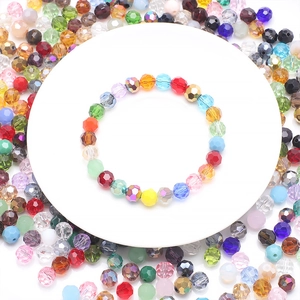 Top view of colorful faceted glass crystal beads on a display stand for DIY jewelry making