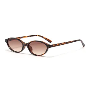Fashionable retro oval sunglasses with tortoiseshell frame and brown gradient lenses