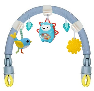 Detail showing baby activity arch with plush bird, hedgehog rattle, and sun toy pendants