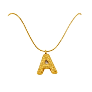 Gold snake chain necklace with a textured letter A pendant featuring a hammered finish