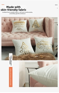 Detail of white velvet pillowcase featuring golden foil Christmas tree and Merry Christmas text
