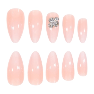 Faux ongles amande longs rose nude dégradé avec accents de fleurs en strass