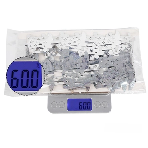 Silver laser star and moon party confetti weighing 60g in transparent packaging