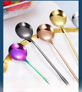 Macro shot of mirror-polished stainless steel long handle spoons in five vibrant colors