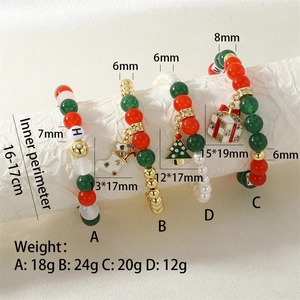 Detailed view of Christmas beaded bracelets with pearl accents and enamel charms
