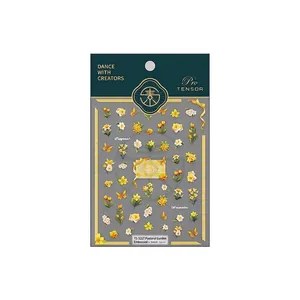 3D embossed floral nail art stickers featuring yellow flowers and butterfly garden designs