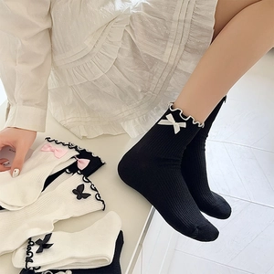 Detail of JK style cotton socks featuring lace trim and cute decorative bows in multiple colors