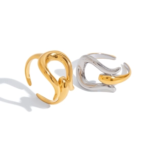 Minimalist sleek irregular titanium steel rings in gold and two-tone silver finishes