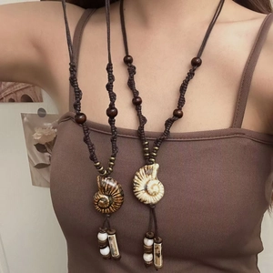 Zen style vintage ceramic pendant necklace with brown woven cord and shell charm for women
