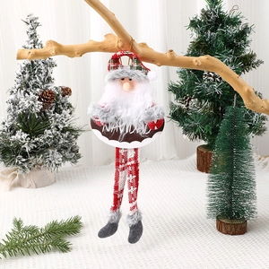 Detail of hanging Santa plush decoration with Navidad sign and long dangling legs
