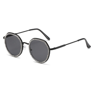Fashionable rhinestone sunglasses with black metal round frames and dark grey lenses