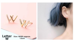 Macro view and model wearing a gold W-shaped earring with zircon micro-pave detailing
