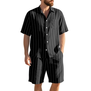 Detail of men's summer linen set showing black and white vertical stripes and mandarin collar