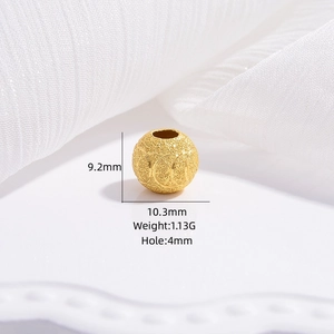 Detailed macro view of 9.2mm gold frosted S925 sterling silver hollow bead with patterns