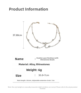 Detail view showing dimensions of double-layered chain necklace with beads and rhinestone