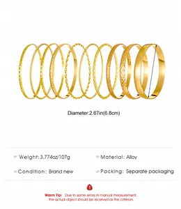 Detailed set of 11 gold alloy bangles with textured patterns and polished finishes