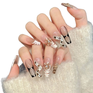 Handmade leopard print press-on nails with 3D flower and rhinestone details