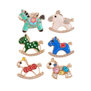 Set of six colorful rhinestone cartoon horse brooches with enamel finish in various patterns