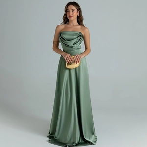 Detail view of the sage green satin evening dress featuring a ruched strapless neckline