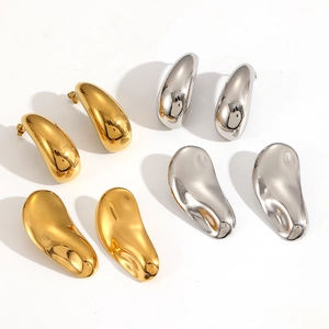 Irregular twisted stainless steel earrings in polished gold and silver finishes