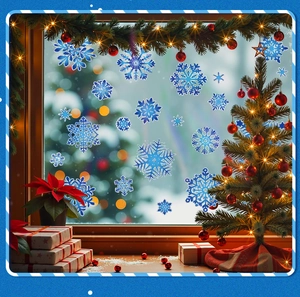 Blue snowflake window stickers displayed on glass with festive Christmas decor