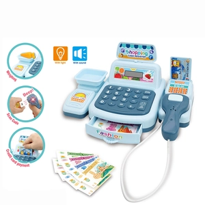 Detail view of kids toy cash register with scanner and credit card functions