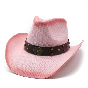 Detail of pink woven straw cowboy hat featuring a leather band with bull head metal buckle
