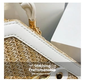 Detail of hand-woven straw bag showing white leather trim and golden metal lock
