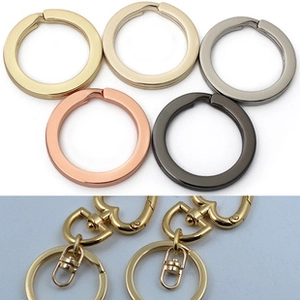 Polished metal swivel lobster clasps and flat O-rings in gold, silver, and black finish