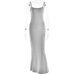 Close-up of gray backless slip dress showing soft fabric texture and slim fit design