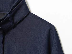 Detailed close-up of navy blue pilot jacket showing collar and shoulder stitching