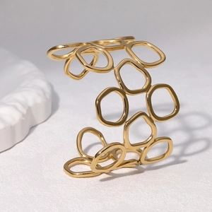Bracelet manchette doré poli avec cercles géométriques creux en acier inoxydable