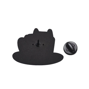 Detail view of the black metal cat in coffee cup brooch back with rubber clutch