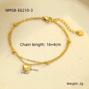 Detail view of double-layer steel bracelet with heart charm and dimension annotations