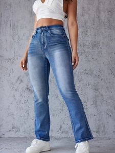 Detailed full view of high-waisted distressed blue flared jeans with button closure