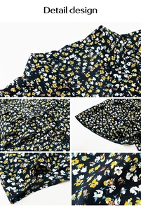Detail design showing dark blue floral print blouse with ruffled neckline and sleeves