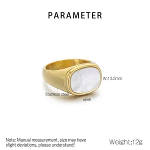 Detail of square gold stainless steel ring with white shell inlay and 13.5mm width
