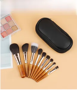 Close-up of 10-piece makeup brush set with wooden handles and rose gold tubes