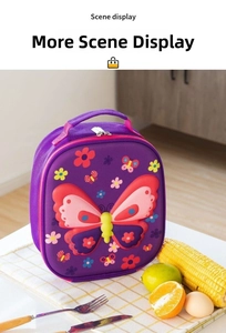 Detailed view of purple butterfly lunch bag on a dining table with fresh fruit and food