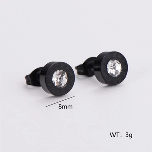 Macro shot of 8mm black stainless steel stud earrings with Roman numerals and zircon