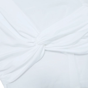 Detail shot of the front twist knot design and ribbed fabric texture on white crop top