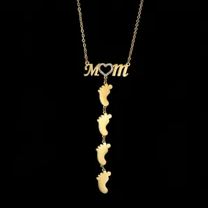Gold plated stainless steel MOM necklace with heart zircon and four baby feet pendants