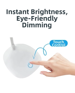 Detail of white desk lamp base showing touch control button and adjustable dimming feature